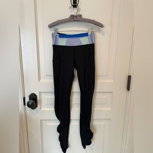 Lululemon black leggings with pattern waistband.